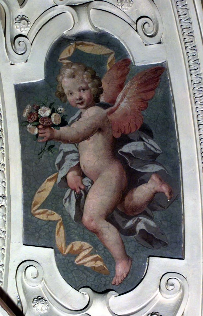 Angelo con bouquet di rose